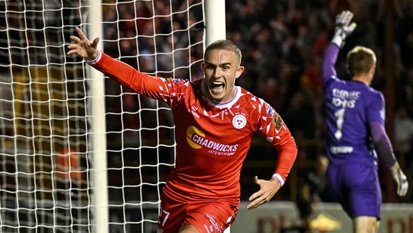 Evan Caffrey of Shelbourne celebrates after scoring his side's third goal during the UEFA Conference League Play-off Round first leg match between Shelbourne and Linfield at Tolka Park in Dublin