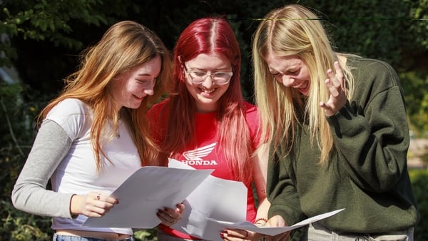 (Left to right) Ciara Gibney, Jessie Brennan and Jody Whelan receive their Leaving Certificate results, at The Donahies Community School in Dublin