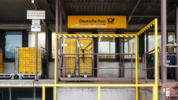 Postal containers are pictured at a Deutsche Post loading area in Munich, Germany