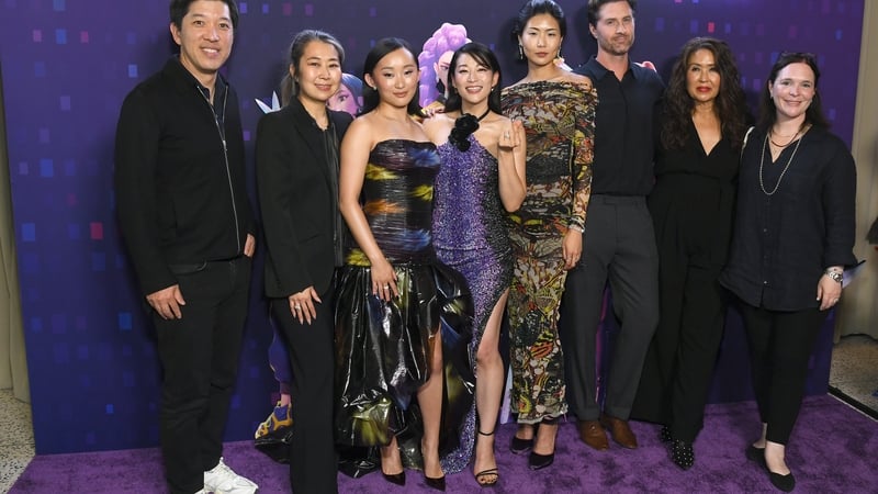 (L-R) Netflix Film Chair Dan Lin, KPop Demon Hunters co-writer/co-director Maggie Kang, actors Ji-Young Yoo, Arden Cho, and May Hong, co-writer/co-director Chris Appelhans, producer Michelle Wong and Netflix Animation head Hannah Minghella in Los Angeles