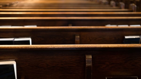 rows of wooden pews ~ shot with canon eos rp
