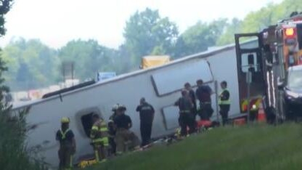 Emergency services near an overturned bus