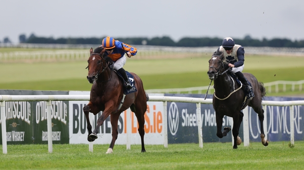 Constitution River (left) ridden by Wayne Lordan wins the Coolmore Stud Wootton Bassett Tom Cooper Irish European Breeders Fund Futurity Stakes at Curragh Racecourse