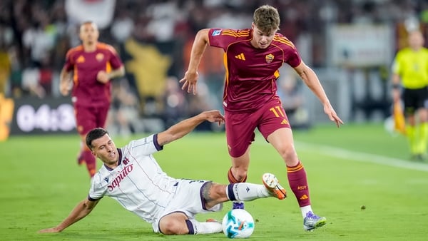 Evan Ferguson of AS Roma and Nicolo' Casale of Bologna FC 1909 compete for the ball during the Serie A Enilive match between AS Roma and Bologna FC 1909 at Stadio Olimpico on August 23, 2025 in Rome, Italy. (Photo by Giuseppe Maffia/NurPhoto via Getty Ima