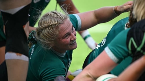 Neve Jones celebrates her try in Ireland's 42-14 win against Japan