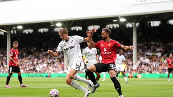 Fulham's Sander Berge (left) and Manchester United's Matheus Cunha