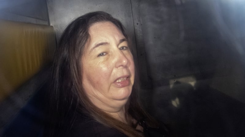 This picture taken on 12 May shows Erin Patterson in the back of a prison transport vehicle while attending her trial