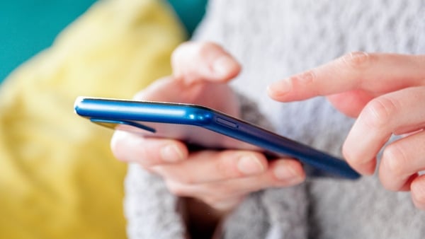 A person using a mobile phone