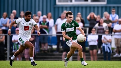 Charlestown's Paul Towey (R) in action against Shairoze Akram of Ballaghaderreen