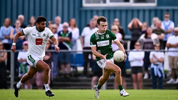 Paul Towey of Charlestown Sarsfields in action against Shairoze Akram of Ballaghaderreen during the Mayo County Senior Club Football Championship Round 2 match between Charlestown Sarsfields and Ballaghaderreen at Fr O'Hara Park in Charlestown, Mayo. Phot
