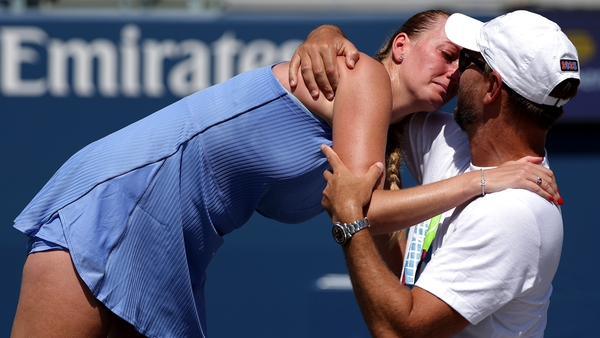 NEW YORK, NEW YORK - AUGUST 25: Petra Kvitova of the Czech Republic embraces her husband and coach Jiří Vaněk after her Women's Singles First Round match against Diane Parry of France for her final match before retiring on Day Two of the 2025 US Open at U