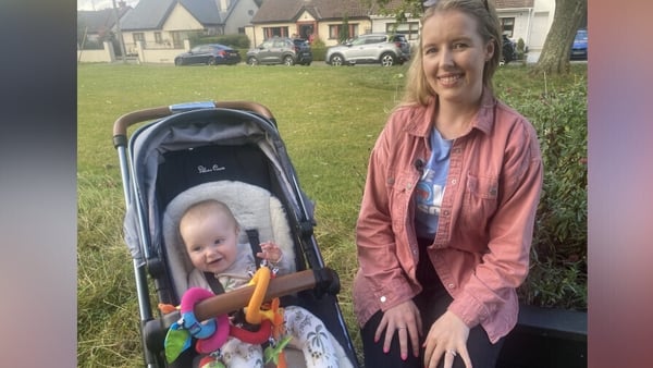 Mother Aisling Farragher with her baby beside her in a buggy