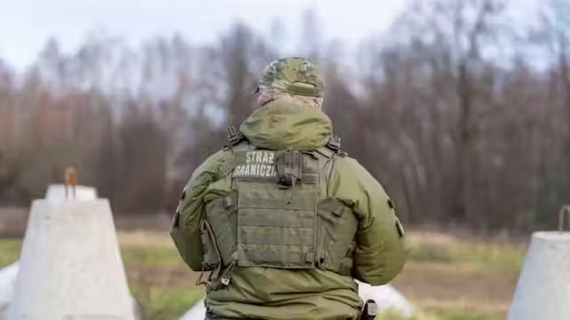A Polish border guard patrols the Polish-Russian border at the first completed section of the East Shield, a national defence initiative launched to strengthen Poland's eastern borders with Belarus and the Russian exclave of Kaliningrad. Photo: Zuma/Alamy