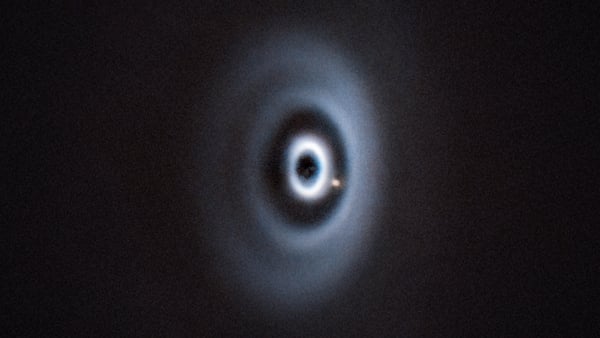 An image shows newly discovered planet WISPIT 2b