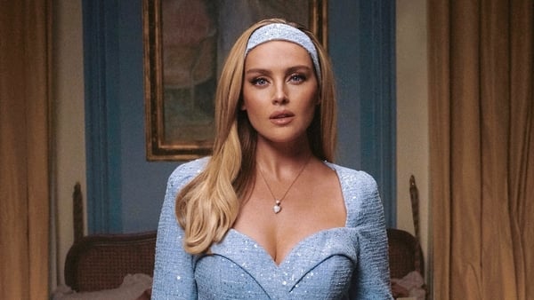 Perrie Edwards posing for a photo in a promotional photo