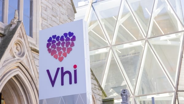 A sign with VHI on it and a stylised heart