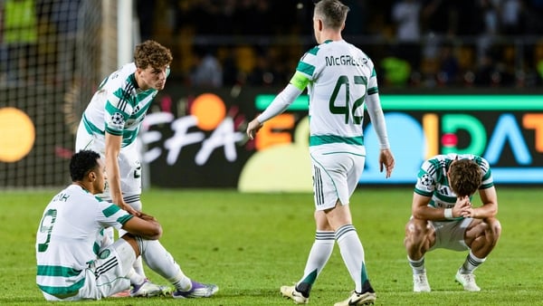 ALMATY, KAZAKHSTAN - AUGUST 26: (L-R) Celtic's Adam Idah, Arne Engels, Callum McGregor and Luke McCowan look dejected at full time during a UEFA Champions League Play-Off Secong Leg match between Kairat Almaty and Celtic at the Almaty Ortalyk Stadion, on