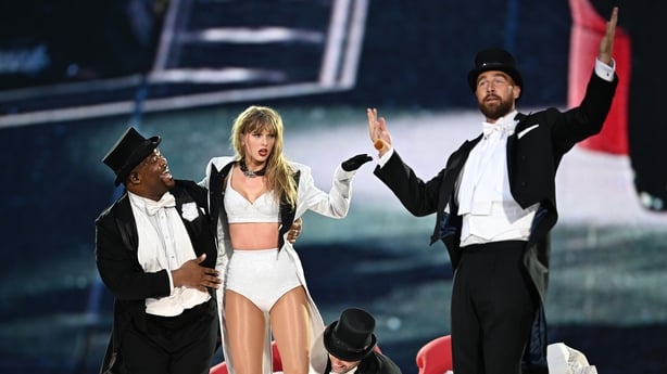 Taylor Swift is joined on stage by Travis Kelce during Taylor Swift The Eras Tour at Wembley Stadium
