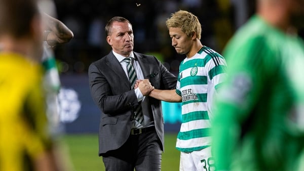 ALMATY, KAZAKHSTAN - AUGUST 26: Celtic's Daizen Maeda (R) and Manager Brendan Rodgers look dejected at full time during a UEFA Champions League Play-Off Secong Leg match between Kairat Almaty and Celtic at the Almaty Ortalyk Stadion, on August 26, 2025, i