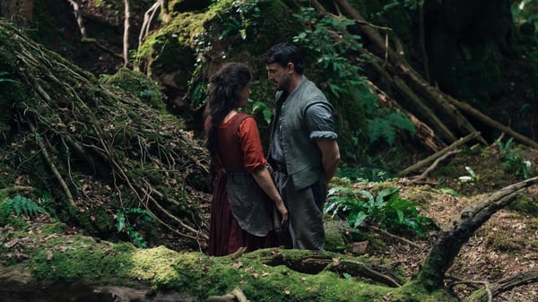 Jessie Buckley as Agnes and Paul Mescal as William Shakespeare in a woodland scene from director Chloé Zhao’s Hamnet