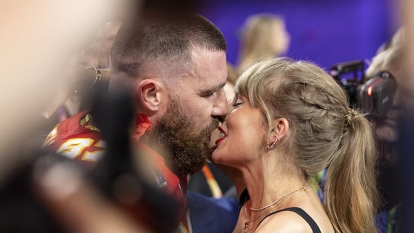 Travis Kelce and Taylor Swift kiss in the aftermath of the NFL Super Bowl 58 football game between the San Francisco 49ers and the Kansas City Chiefs, Sunday, 11 February, 2024, in Las Vegas
