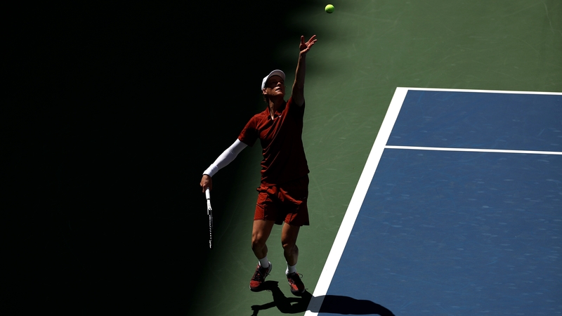 Jannik Sinner serves against Vit Kopriva