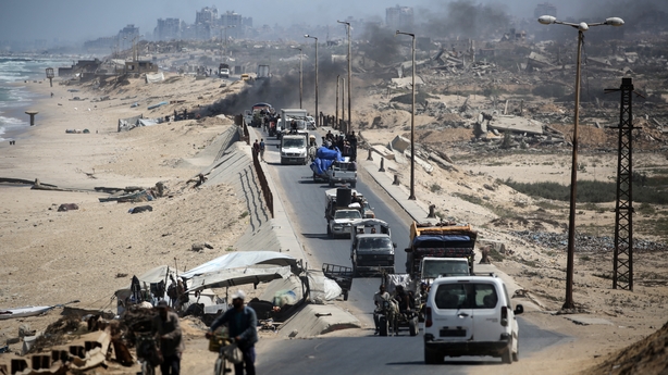 Displaced Palestinians flee Gaza City towards the southern areas of the Gaza, in Nuseirat
