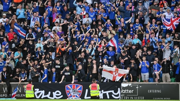16 July 2025; Linfield supporters celebrate after a Shelbourne goal was ruled out by VAR during the UEFA Champions League First Qualifying Round second leg match between Linfield and Shelbourne at Clearer Twist National Football Stadium at Windsor Park in Belfast. Photo by Stephen McCarthy/Sportsfil