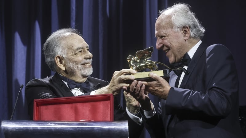 Werner Herzog (right) was handed a special winged Golden Lion statue by The Godfather director and friend Francis Ford Coppola, who praised the German's "limitless creativity"