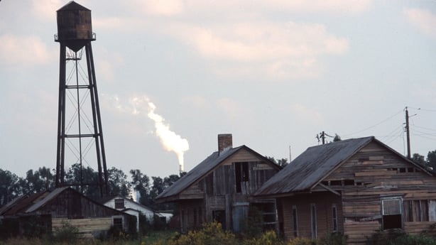 LOUISIANA- OCTOBER: Oil and chemical refinery plants cover the landscape, next to African American communities along the Mississippi River, October, 1998, south of Baton Rouge, Louisiana. (Photo by Andrew Lichtenstein/Corbis via Getty Images)