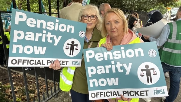 School secretaries Jacinta Brady and Ger Doyle are among the workers on strike