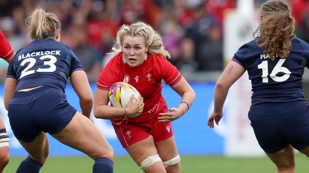 SALFORD, ENGLAND - AUGUST 23: Alex Callender of Wales breaks away with the ball, is challenged by Beth Blacklock of Scotland and Elis Martin of Scotland during the Women's Rugby World Cup 2025 Pool B match between Scotland and Wales at the Salford Community Stadium on August 23, 2025 in Salford, Eng