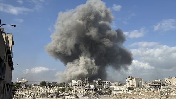 Smoke rises over residential areas after the Israeli army attacks ez-Zeytun neighborhood in southern Gaza City