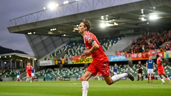 28 August 2025; Harry Wood of Shelbourne celebrates after scoring his side's first goal during the UEFA Conference League Play-off Round second leg match between Linfield and Shelbourne at the Clearer Twist National Football Stadium at Windsor Park in Bel