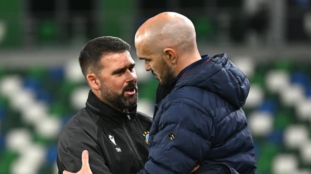 Linfield manager David Healy, left, and Shelbourne head coach Joey O'Brien shake hands at the final whistle of the UEFA Conference League Play-off Round second leg match between Linfield and Shelbourne at the Clearer Twist National Football Stadium at Windsor Park in Belfast. Photo by Ramsey Cardy/S