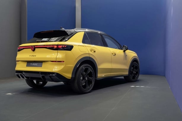 A shot of the back of a yellow car