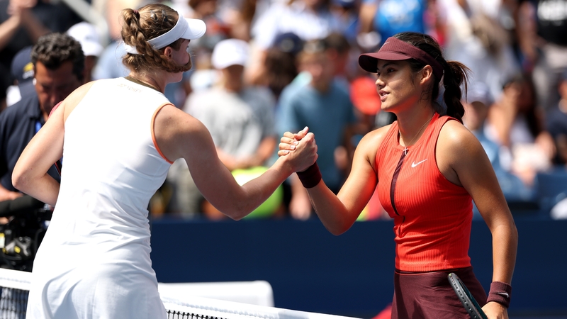 Elena Rybakina (L) and Emma Raducanu shake hands following their third-round match