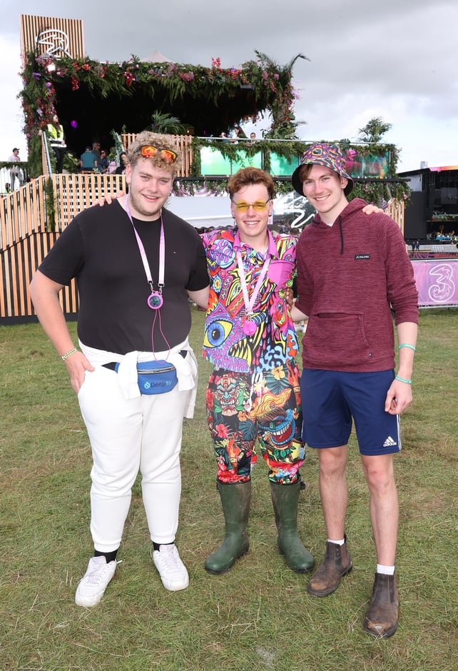 Festival goers Sam Carey, Liam Tierney and Kyle Byrne pose for a photo at Electric Picnic