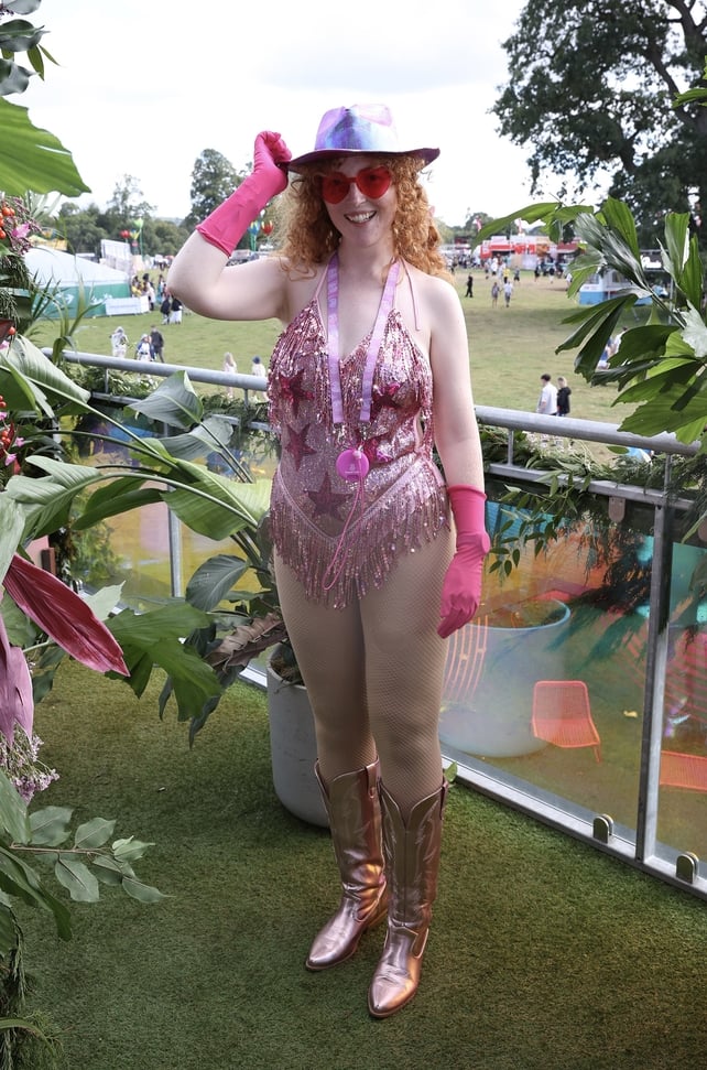 Festival goer Megan O'Malley tips her hat as she poses for a photo at Electric Picnic