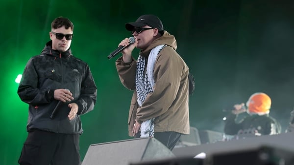 Kneecap's Moglai Bap, Mo Chara, and DJ Provai perform on stage at Belfast Vital.