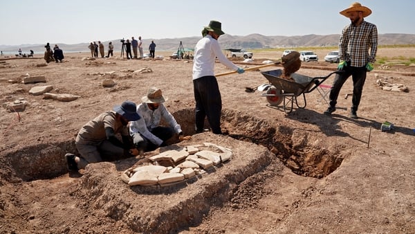 This picture shows ancient graves unearthed by members of the Dohuk Antiquities Department on the banks of Mosul Dam in Iraq