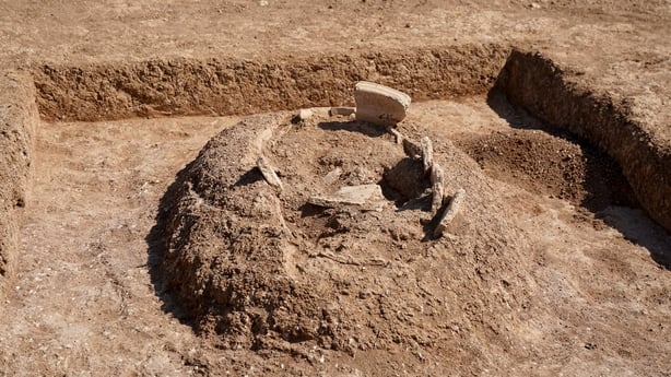 This picture shows ancient graves unearthed by members of the Dohuk Antiquities Department on the banks of Mosul Dam in Iraq