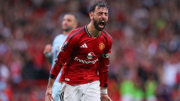 MANCHESTER, ENGLAND - AUGUST 30: Bruno Fernandes of Manchester United celebrates after scoring their side's third goal from the penalty spot during the Premier League match between Manchester United and Burnley at Old Trafford on August 30, 2025 in Manche