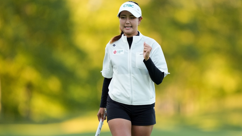 Miranda Wang celebrates a birdie on the 14th hole at TPC Boston