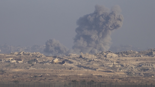 Smoke rises after Israeli forces carry out strikes on a neighbourhood in Gaza City