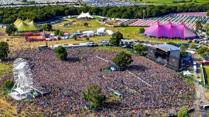 Crowds gather for Kneecap