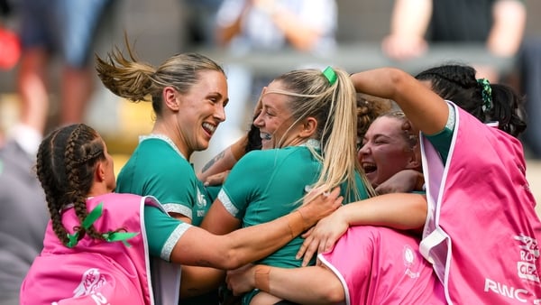 31 August 2025; Ireland players, including Anna McGann, left, and Stacey Flood, centre, celebrate their second try scored by Amee Leigh Costigan, hidden, during the Women's Rugby World Cup 2025 Pool C match between Ireland and Spain at Franklin's Gardens