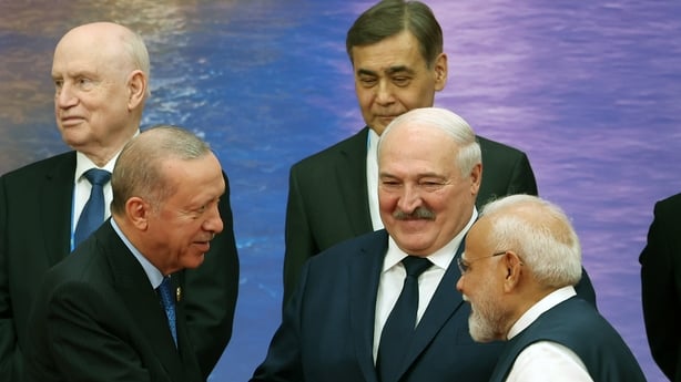 TIANJIN, CHINA - AUGUST 31: (----EDITORIAL USE ONLY - MANDATORY CREDIT - 'TURKISH PRESIDENCY / MURAT KULA/ HANDOUT' - NO MARKETING NO ADVERTISING CAMPAIGNS - DISTRIBUTED AS A SERVICE TO CLIENTS----) Turkish President Recep Tayyip Erdogan (L) shakes hands with Indian Prime Minister Narendra Modi (R)
