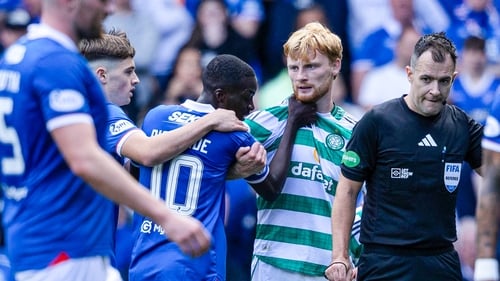Ireland and Celtic defender Liam Scales tussles with Rangers' Mohamed Diomande