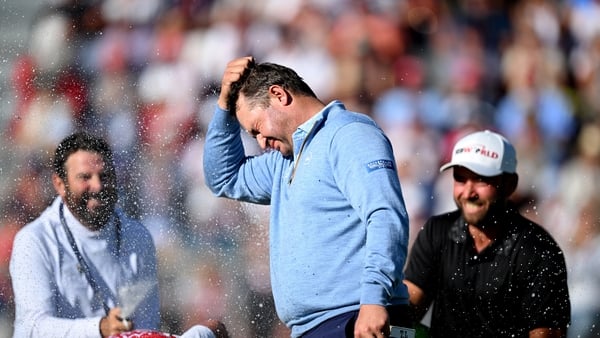 CRANS-MONTANA, SWITZERLAND - AUGUST 31: Thriston Lawrence of South Africa is sprayed with champagne as he celebrates victory on the 18th green on day four of the Omega European Masters 2025 at Crans-sur-Sierre Golf Club on August 31, 2025 in Crans-Montana